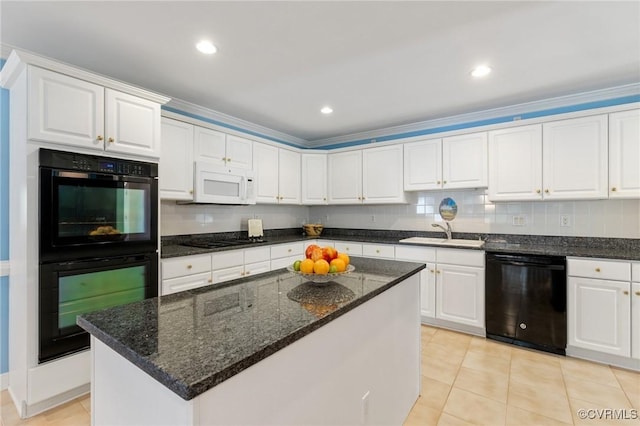 4410 Sharonridge Dr, North Chesterfield, VA 23236 - kitchen with black appliances, white cabinets, light tile patterned floors, a kitchen island, and recessed lighting