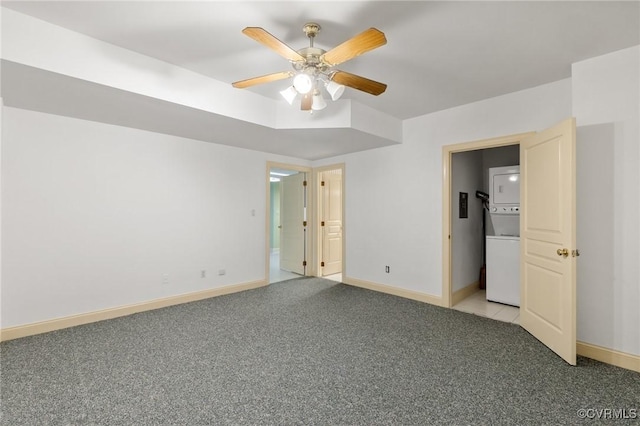 4410 Sharonridge Dr, North Chesterfield, VA 23236 - unfurnished bedroom featuring stacked washer and clothes dryer, light colored carpet, and a ceiling fan