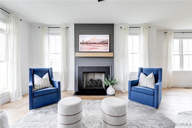 3013 Swanns Inn Cres, Goochland, VA 23063 - sitting room with a fireplace and wood finished floors
