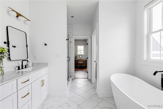 3013 Swanns Inn Cres, Goochland, VA 23063 - full bath featuring vanity, marble finish flooring, a soaking tub, and a stall shower