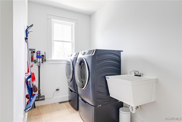 3013 Swanns Inn Cres, Goochland, VA 23063 - laundry room with independent washer and dryer and baseboards