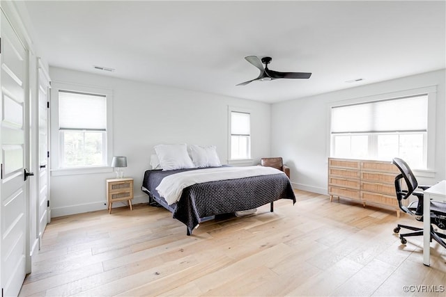 3013 Swanns Inn Cres, Goochland, VA 23063 - bedroom featuring multiple windows, light wood finished floors, ceiling fan, and a desk