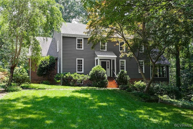 12103 Wexwood Pl, North Chesterfield, VA 23236 - colonial house featuring a front yard and a shingled roof
