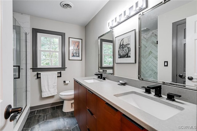 12103 Wexwood Pl, North Chesterfield, VA 23236 - bathroom with plenty of natural light, double vanity, and a stall shower