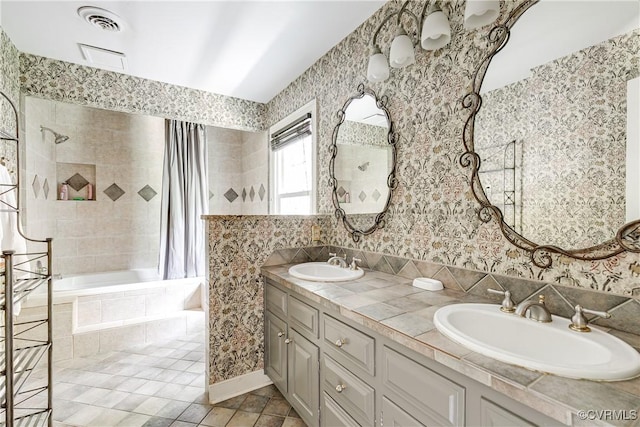 12103 Wexwood Pl, North Chesterfield, VA 23236 - bathroom featuring tiled shower / bath combo, double vanity, and tile patterned flooring