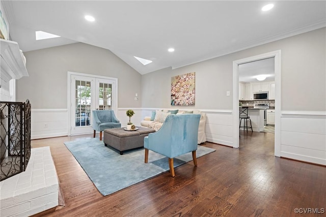 2801 Aspinwald Dr, Henrico, VA 23233 - living room featuring a skylight, dark wood-style floors, a wainscoted wall, and recessed lighting