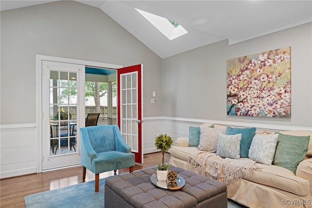 2801 Aspinwald Dr, Henrico, VA 23233 - living area featuring a skylight, wainscoting, wood finished floors, and vaulted ceiling