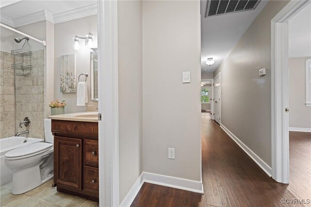 2801 Aspinwald Dr, Henrico, VA 23233 - full bathroom featuring vanity, shower / tub combination, crown molding, and wood finished floors