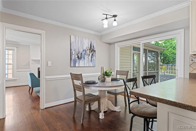 2801 Aspinwald Dr, Henrico, VA 23233 - dining area featuring dark wood-type flooring and crown molding
