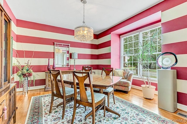 302 Myrtle St Unit F, Ashland, VA 23005 - dining room featuring a chandelier and wood finished floors