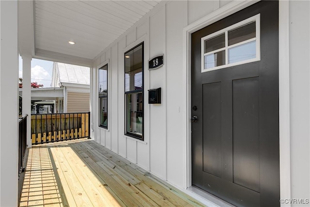 18 W 29th St, Richmond, VA 23223 - entrance to property with board and batten siding and a porch