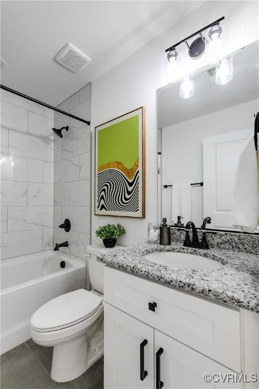 18 W 29th St, Richmond, VA 23223 - bathroom with vanity, shower / tub combination, and tile patterned flooring