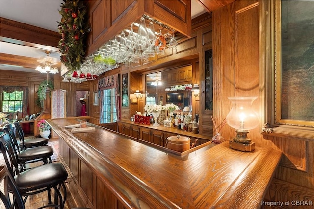 985 Kingston Ln, North, VA 23128 - indoor dry bar featuring wooden walls