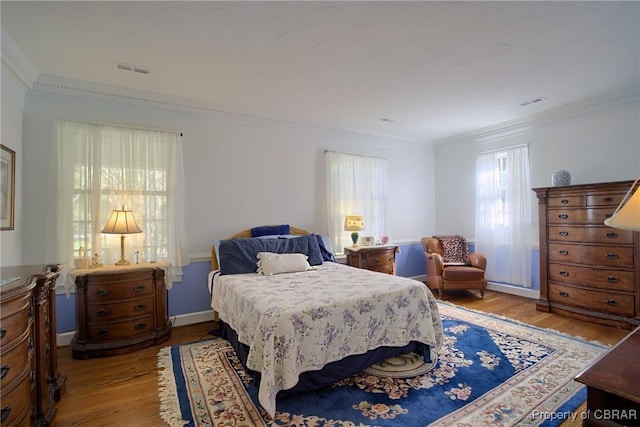 985 Kingston Ln, North, VA 23128 - bedroom with ornamental molding and wood finished floors
