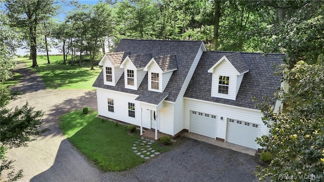 985 Kingston Ln, North, VA 23128 - view of front of home featuring driveway, an attached garage, a front yard, and roof with shingles
