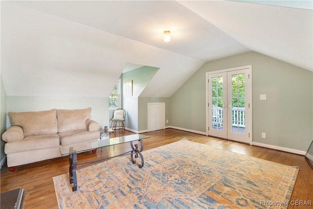 985 Kingston Ln, North, VA 23128 - living room featuring wood finished floors and vaulted ceiling