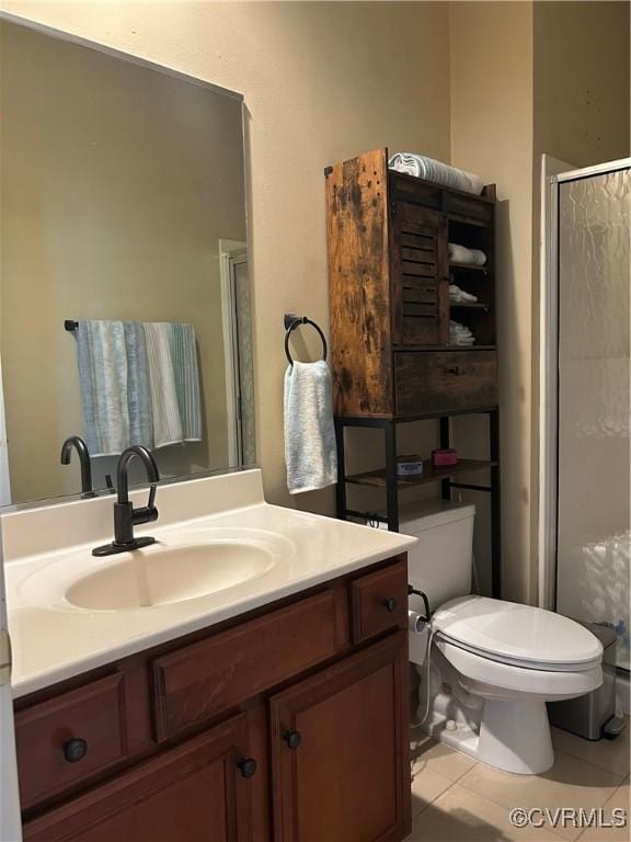 5623 Virginia Park Dr, Providence Forge, VA 23140 - bathroom featuring vanity, a shower stall, and tile patterned flooring