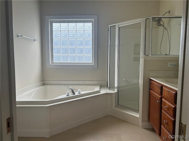5623 Virginia Park Dr, Providence Forge, VA 23140 - bathroom with a shower stall, a garden tub, vanity, and tile patterned floors