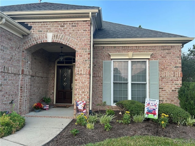 5623 Virginia Park Dr, Providence Forge, VA 23140 - entrance to property featuring a shingled roof and brick siding