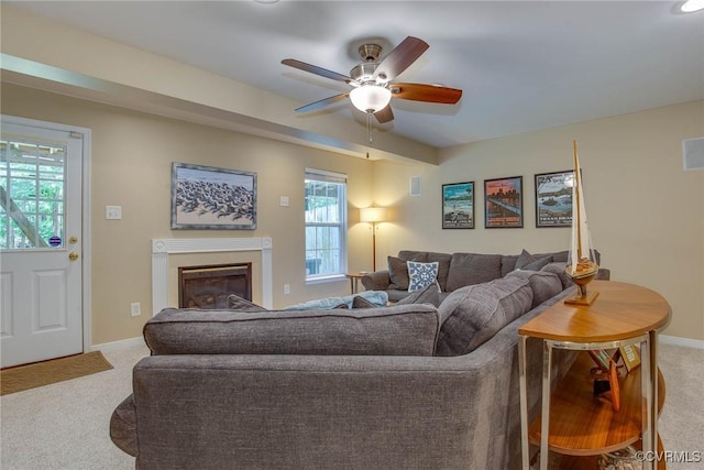 8750 Springwater Dr, Henrico, VA 23228 - living area with carpet flooring, ceiling fan, and a glass covered fireplace