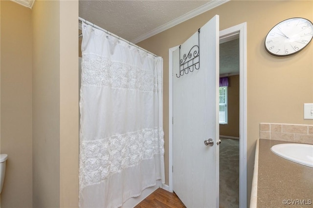 3737 Shelton Store Rd, Buckingham, VA 23921 - full bath with a bathtub, ornamental molding, a textured ceiling, and a shower with shower curtain