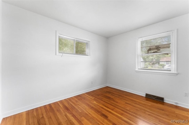 5425 Germain Rd, Richmond, VA 23224 - unfurnished room with healthy amount of natural light and wood finished floors