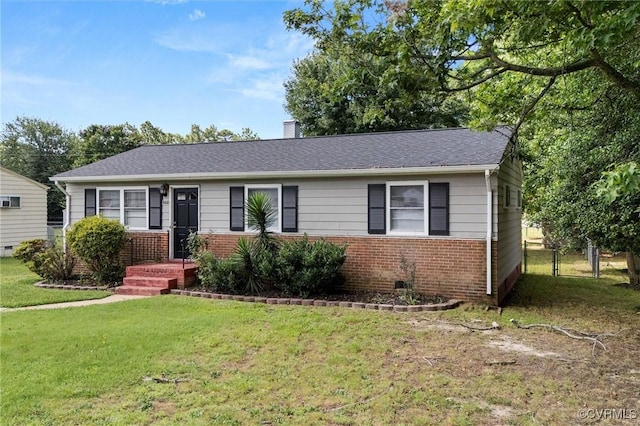5425 Germain Rd, Richmond, VA 23224 - view of front of house with brick siding and a chimney