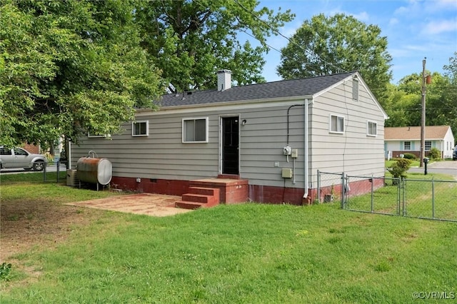 5425 Germain Rd, Richmond, VA 23224 - view of front of home featuring oil tank, crawl space, a chimney, and a gate