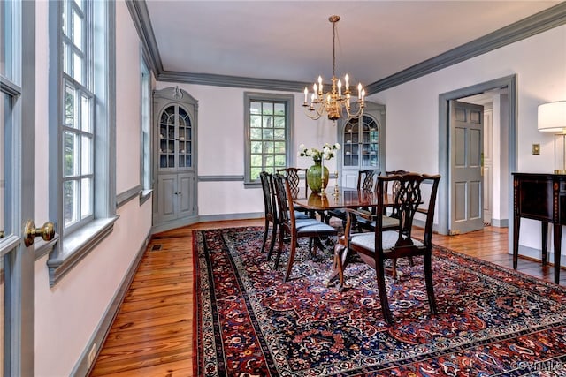 99 Walnut Hills Dr, Williamsburg, VA 23185 - dining room featuring a chandelier, ornamental molding, and light wood finished floors