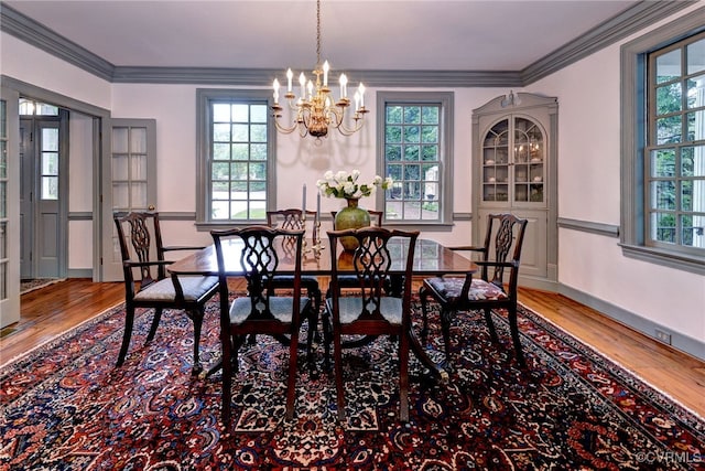 99 Walnut Hills Dr, Williamsburg, VA 23185 - dining area with a chandelier, plenty of natural light, wood finished floors, and crown molding