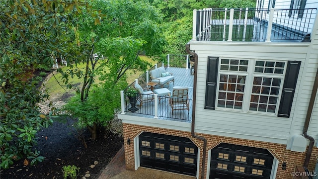 99 Walnut Hills Dr, Williamsburg, VA 23185 - wooden terrace featuring a garage