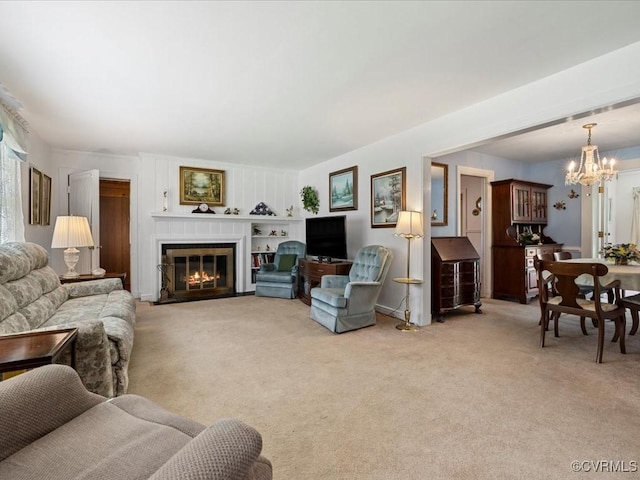 5913 Ridge Rd, Henrico, VA 23227 - living room featuring a chandelier, light carpet, and a fireplace with flush hearth