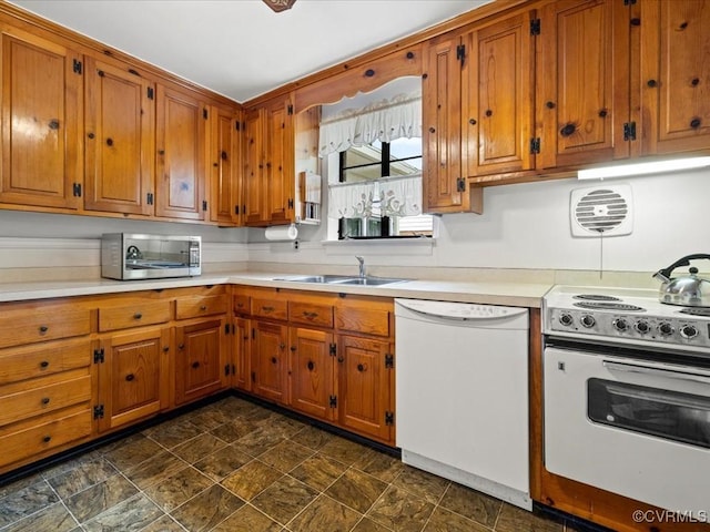 5913 Ridge Rd, Henrico, VA 23227 - kitchen featuring white dishwasher, electric range, stainless steel microwave, and brown cabinetry