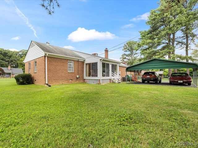 5913 Ridge Rd, Henrico, VA 23227 - back of house featuring brick siding, a detached carport, a lawn, and crawl space