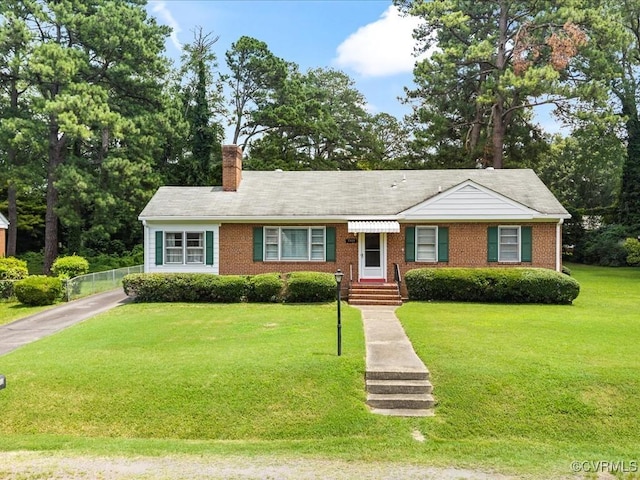 5913 Ridge Rd, Henrico, VA 23227 - view of front of house featuring a chimney, brick siding, and driveway