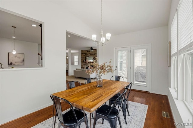 8838 Rushbrooke Ln, Mechanicsville, VA 23116 - dining area with dark wood finished floors, a chandelier, and recessed lighting