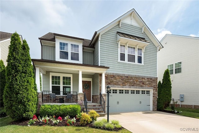 8838 Rushbrooke Ln, Mechanicsville, VA 23116 - craftsman-style home featuring a porch, stone siding, a garage, driveway, and board and batten siding
