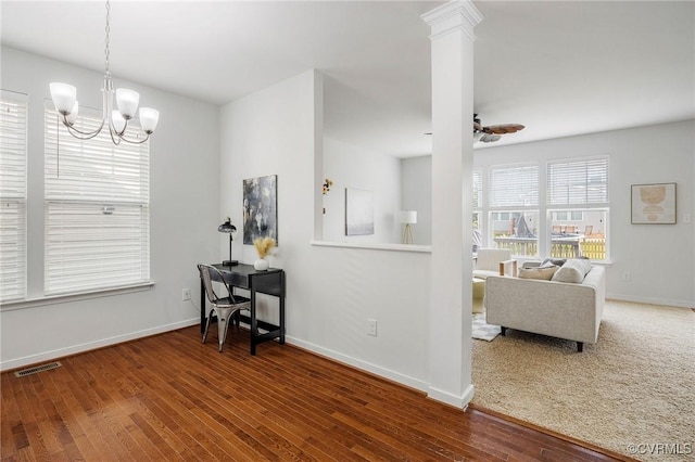 8838 Rushbrooke Ln, Mechanicsville, VA 23116 - dining area featuring wood finished floors, a chandelier, and ceiling fan