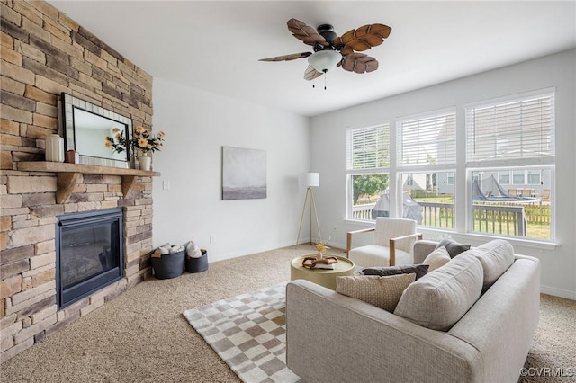8838 Rushbrooke Ln, Mechanicsville, VA 23116 - carpeted living room with a large fireplace and ceiling fan
