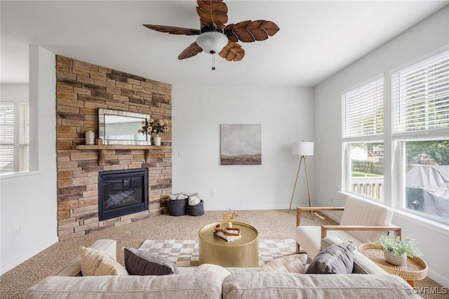 8838 Rushbrooke Ln, Mechanicsville, VA 23116 - carpeted living area with ceiling fan and a fireplace