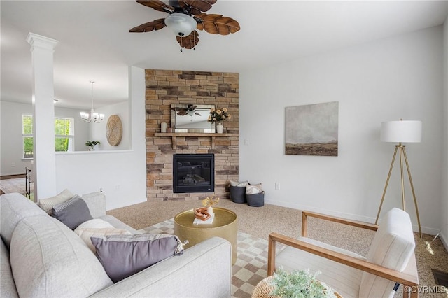 8838 Rushbrooke Ln, Mechanicsville, VA 23116 - living area featuring a ceiling fan, a fireplace, decorative columns, and carpet flooring