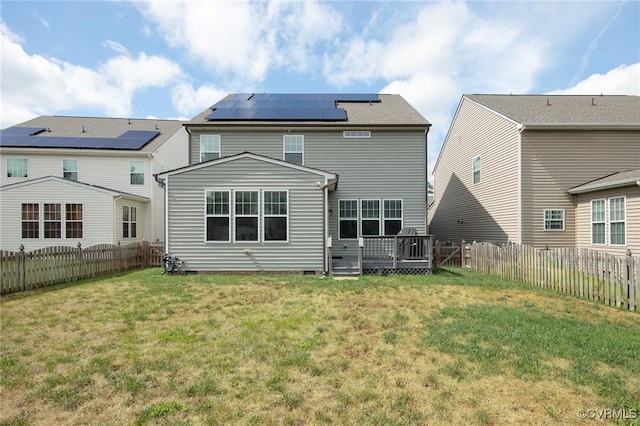 8838 Rushbrooke Ln, Mechanicsville, VA 23116 - back of house with solar panels, a fenced backyard, a deck, and crawl space