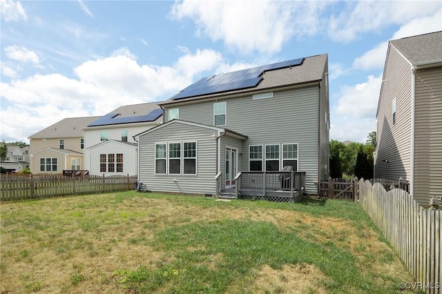 8838 Rushbrooke Ln, Mechanicsville, VA 23116 - rear view of property with solar panels, a fenced backyard, a deck, and crawl space