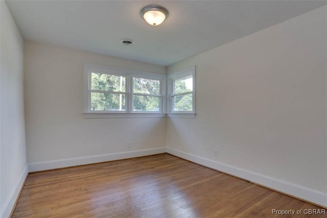 727 Teach St, Hampton, VA 23661 - empty room with baseboards and wood finished floors