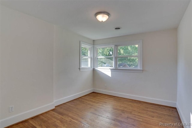 727 Teach St, Hampton, VA 23661 - spare room featuring wood finished floors and baseboards