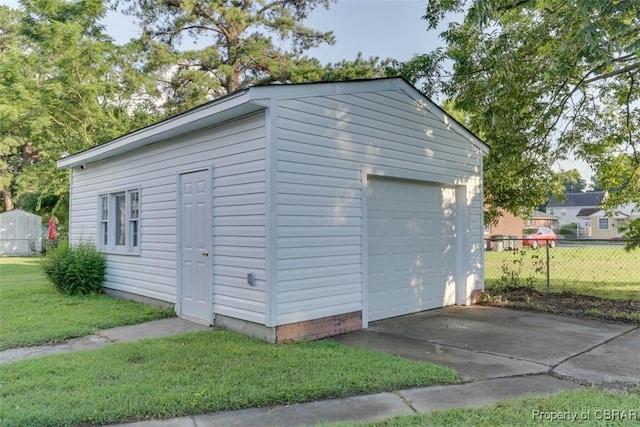 727 Teach St, Hampton, VA 23661 - detached garage featuring driveway
