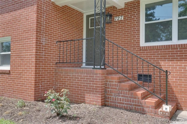 727 Teach St, Hampton, VA 23661 - view of home's exterior featuring brick siding and crawl space