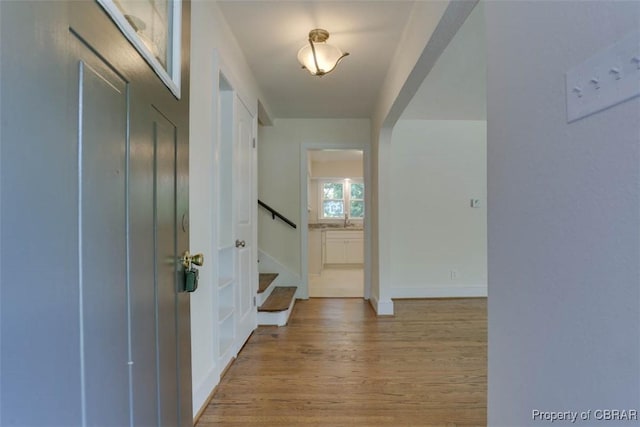727 Teach St, Hampton, VA 23661 - corridor with light wood-type flooring and stairway