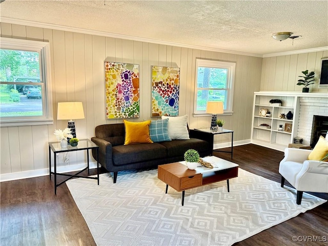 8409 Zell Ln, Henrico, VA 23229 - living room featuring ornamental molding, a textured ceiling, and wood finished floors