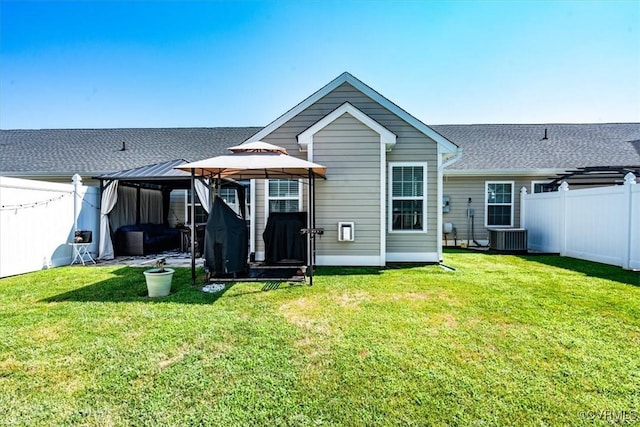 696 Anne Ln, Aylett, VA 23009 - back of house featuring a gazebo, a fenced backyard, and roof with shingles